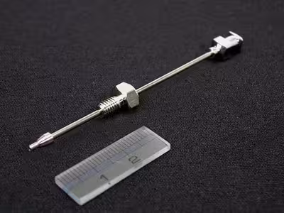 Adaptateur de seringue
