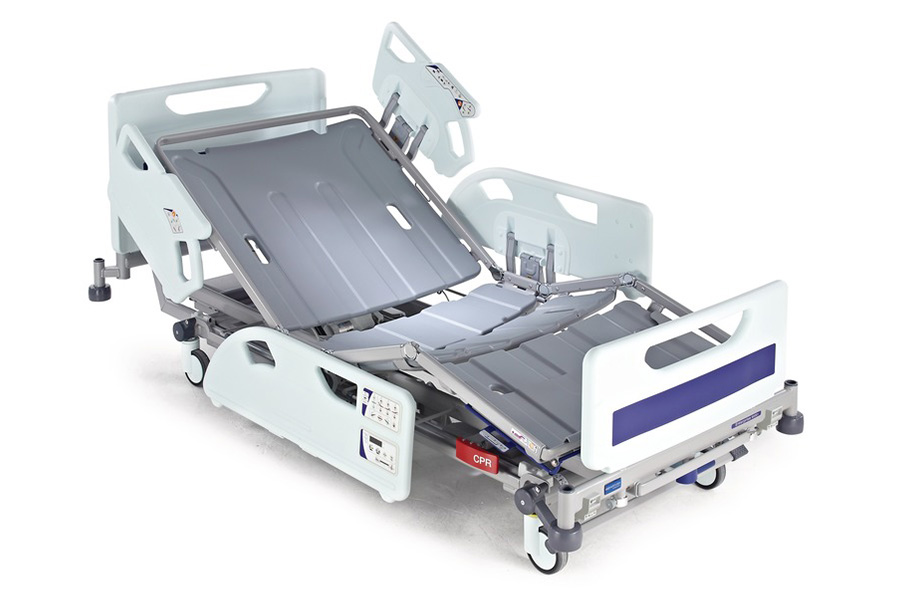 Lit de soins avec commandes intégrées